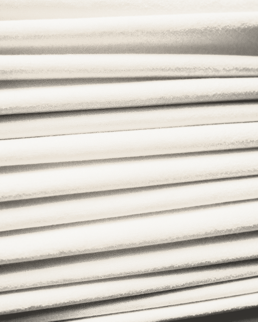 pleated roman shade — cream